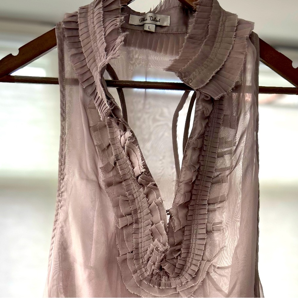 Delicate and feminine grey flowy tank blouse.